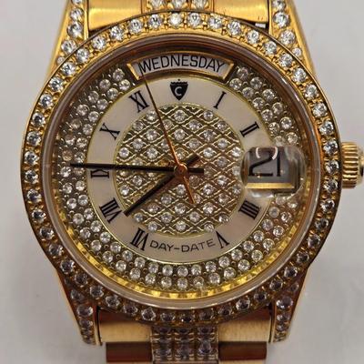 LOT: 702: Gold Tone Croton Watch, Anson Pt. Pending Tie Bar, Chain with Cross Charm, Two Gold Tone "50" Charms, &...