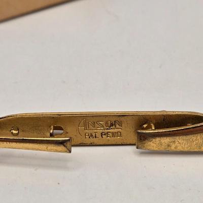 LOT: 702: Gold Tone Croton Watch, Anson Pt. Pending Tie Bar, Chain with Cross Charm, Two Gold Tone "50" Charms, &...