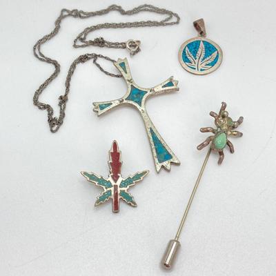 LOT 710: Turquoise and Unmarked Silver Tone Hand Crafted Jewelry - Cross, Marijuana Leaf Pendants and Spider Stick Pin