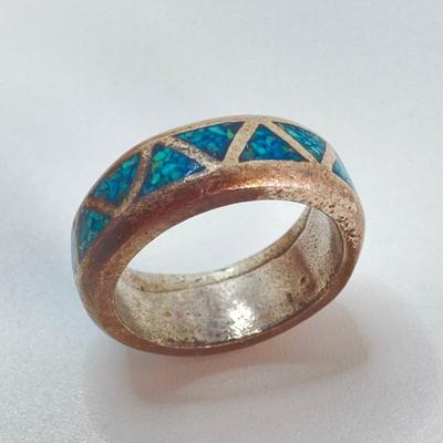 LOT 713: Three Hand Crafted Turquoise Rings - Sizes 11 to 13