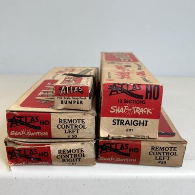 LOT 726: Vintage Train Accessories: Atlas HO Scale Track, Atlas Set, Revell HO Accessories & Aristo-Craft along with a Tyco Penn Line...