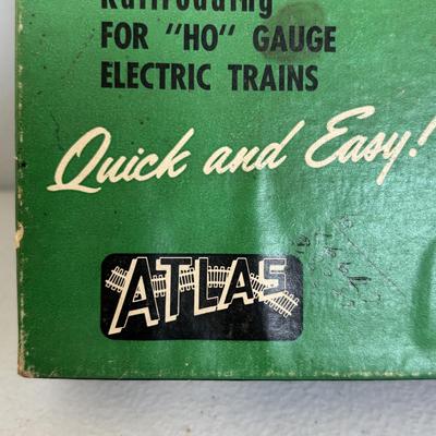 LOT 726: Vintage Train Accessories: Atlas HO Scale Track, Atlas Set, Revell HO Accessories & Aristo-Craft along with a Tyco Penn Line...