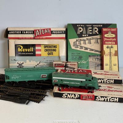 LOT 726: Vintage Train Accessories: Atlas HO Scale Track, Atlas Set, Revell HO Accessories & Aristo-Craft along with a Tyco Penn Line...