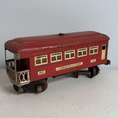 LOT 728: Pre-WWII/2 Lionel Train Commodore Vanderbilt No. 264-E Red Engine & Red Comet Coal Car, 2-Observation #604, 2-Pullman #603
