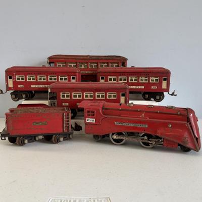 LOT 728: Pre-WWII/2 Lionel Train Commodore Vanderbilt No. 264-E Red Engine & Red Comet Coal Car, 2-Observation #604, 2-Pullman #603