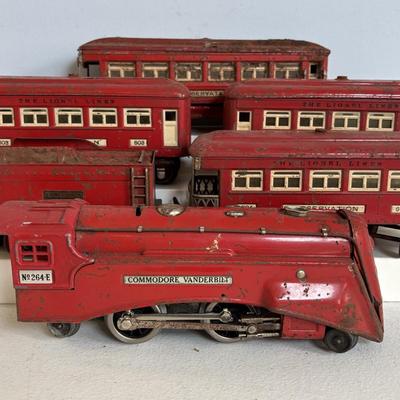 LOT 728: Pre-WWII/2 Lionel Train Commodore Vanderbilt No. 264-E Red Engine & Red Comet Coal Car, 2-Observation #604, 2-Pullman #603