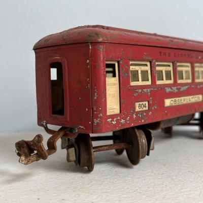 LOT 728: Pre-WWII/2 Lionel Train Commodore Vanderbilt No. 264-E Red Engine & Red Comet Coal Car, 2-Observation #604, 2-Pullman #603