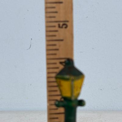 LOT 733: Vintage Cast Iron Ice Cart, Cartridge and Hobo w/Street Lantern