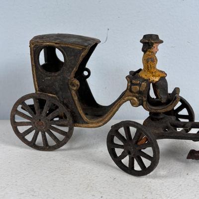 LOT 733: Vintage Cast Iron Ice Cart, Cartridge and Hobo w/Street Lantern