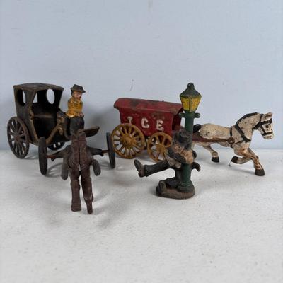 LOT 733: Vintage Cast Iron Ice Cart, Cartridge and Hobo w/Street Lantern
