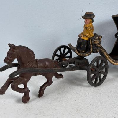 LOT 733: Vintage Cast Iron Ice Cart, Cartridge and Hobo w/Street Lantern
