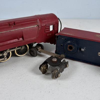 LOT 735: Red Locomotive & Tinder Car, American Flyer Circus Flat Cars with Cages & Truck/Tractors