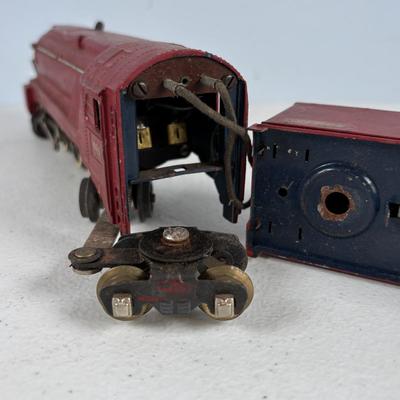 LOT 735: Red Locomotive & Tinder Car, American Flyer Circus Flat Cars with Cages & Truck/Tractors