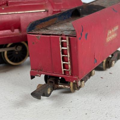 LOT 735: Red Locomotive & Tinder Car, American Flyer Circus Flat Cars with Cages & Truck/Tractors