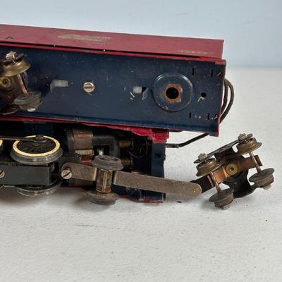 LOT 735: Red Locomotive & Tinder Car, American Flyer Circus Flat Cars with Cages & Truck/Tractors