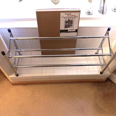 NEW 5 TIER STACKABLE FABRIC SHOE RACK AND A USED ADJUSTABLE SHOE RACK