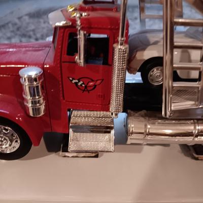 PLASTIC CAR HAULER WITH 4 DIE-CAST CORVETTE MODEL CARS