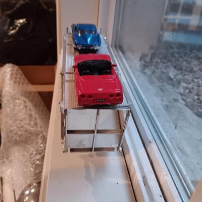 PLASTIC CAR HAULER WITH 4 DIE-CAST CORVETTE MODEL CARS