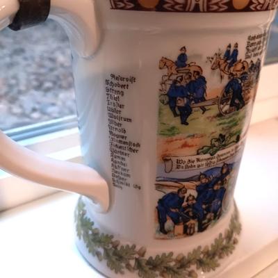 2GERMAN BEER STEINS WITH PEWTER TOPS