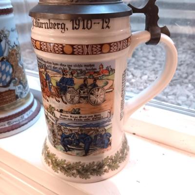 2GERMAN BEER STEINS WITH PEWTER TOPS