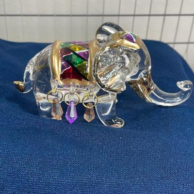 7 miniature Elephants, glass, metal