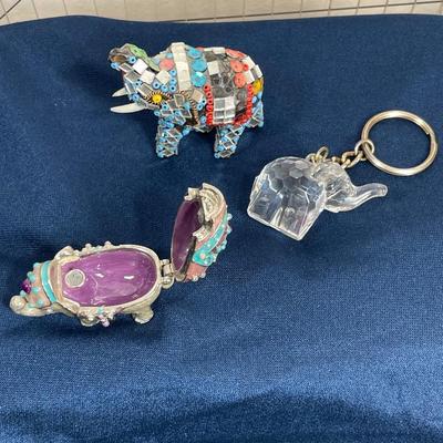 7 miniature Elephants, glass, metal