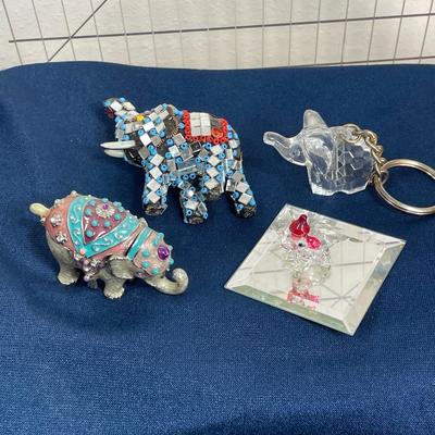 7 miniature Elephants, glass, metal