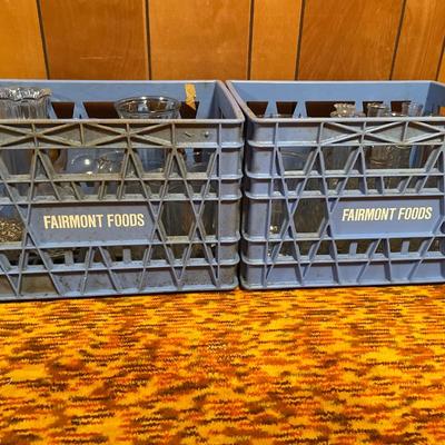 2 Fairmont Foods crates with clear glass vases