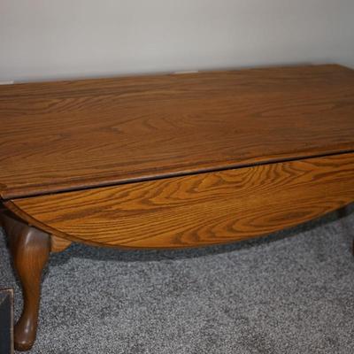 OAK DROP LEAF COFFEE TABLE. SOLID OAK WITH QUEEN ANNE STYLE LEGS