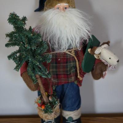 CRAFTED SANTA HOLDING PUPPY AND TREE W/ FRUIT BASE