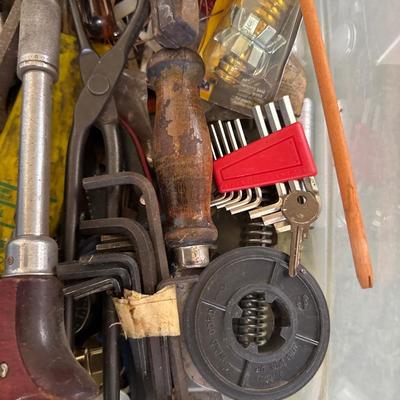 Tote of assorted tools and hardware