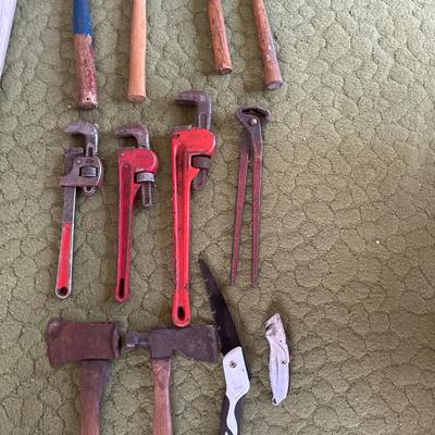 Hammers, pipe wrenches and axes,