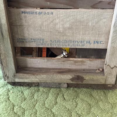 Wooden crate full of hand saw