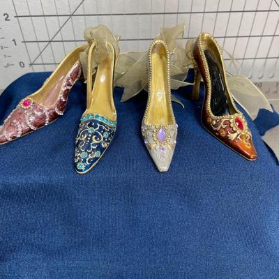 4 Miniature Metal Shoes with Gold Ribbon