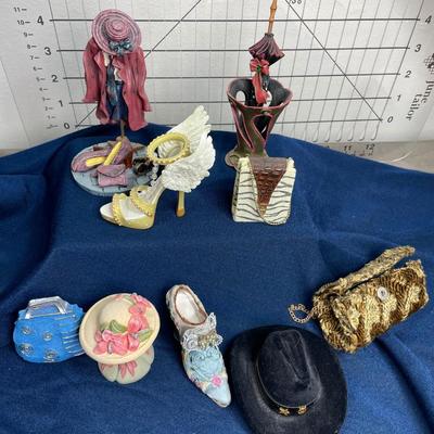 Assorted shoes and purses