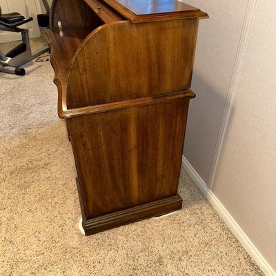 A SMALLER SIZED ROLL TOP DESK