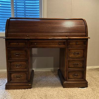 A SMALLER SIZED ROLL TOP DESK
