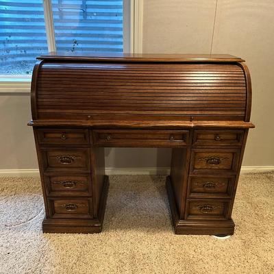 A SMALLER SIZED ROLL TOP DESK