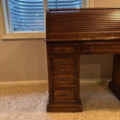A SMALLER SIZED ROLL TOP DESK