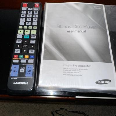 SAMSUNG BLU RAY DISC PLAYER W/REMOTE AND SOME MOVIES ON DVD