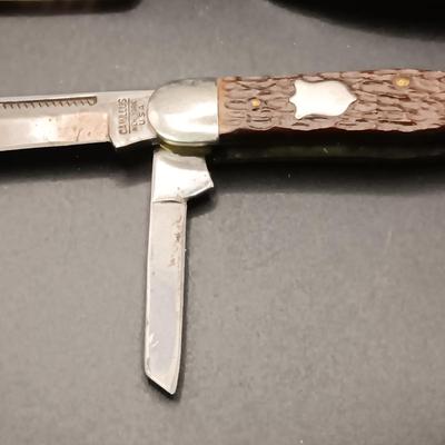 CAMILLUS POCKET KNIFE, BELT BUCKLE & A HIP CLIP