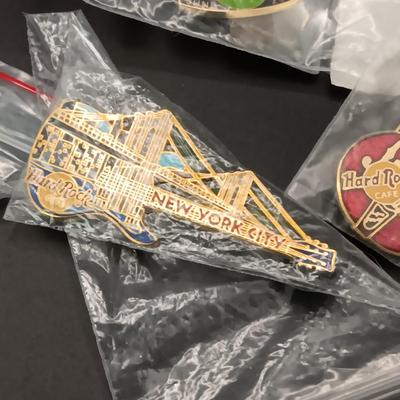HARD ROCK CAFE WATCH AND PINS PLUS SEVERAL OTHER PINS