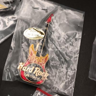 HARD ROCK CAFE WATCH AND PINS PLUS SEVERAL OTHER PINS