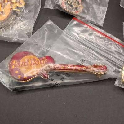 HARD ROCK CAFE WATCH AND PINS PLUS SEVERAL OTHER PINS