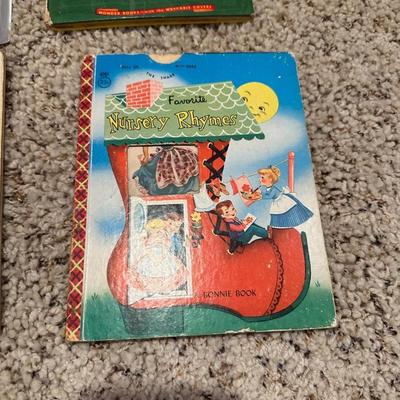 CHILDREN'S VINTAGE BOOKS AND AN ANIMATED PLUSH DOG