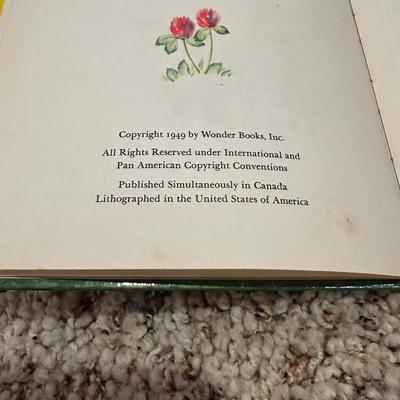 CHILDREN'S VINTAGE BOOKS AND AN ANIMATED PLUSH DOG