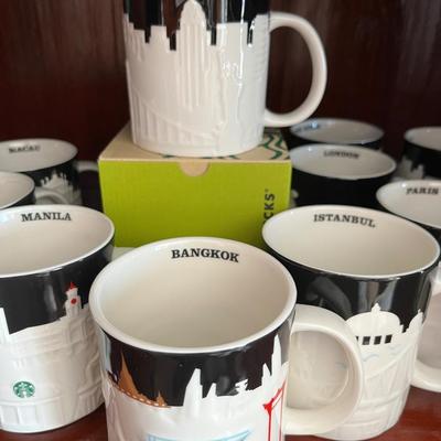 A Collection of 16 Starbucks City Mugs