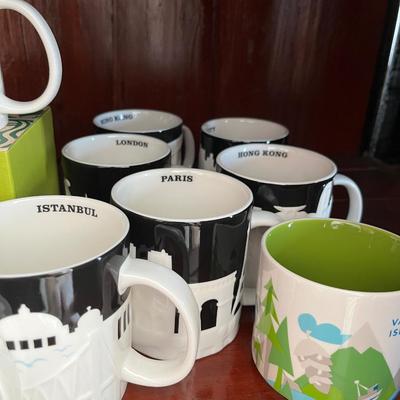 A Collection of 16 Starbucks City Mugs