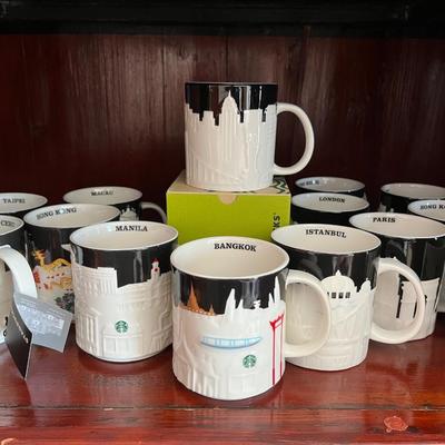 A Collection of 16 Starbucks City Mugs