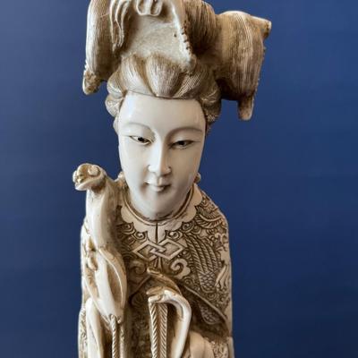 A Pair of Carved Chinese Figures